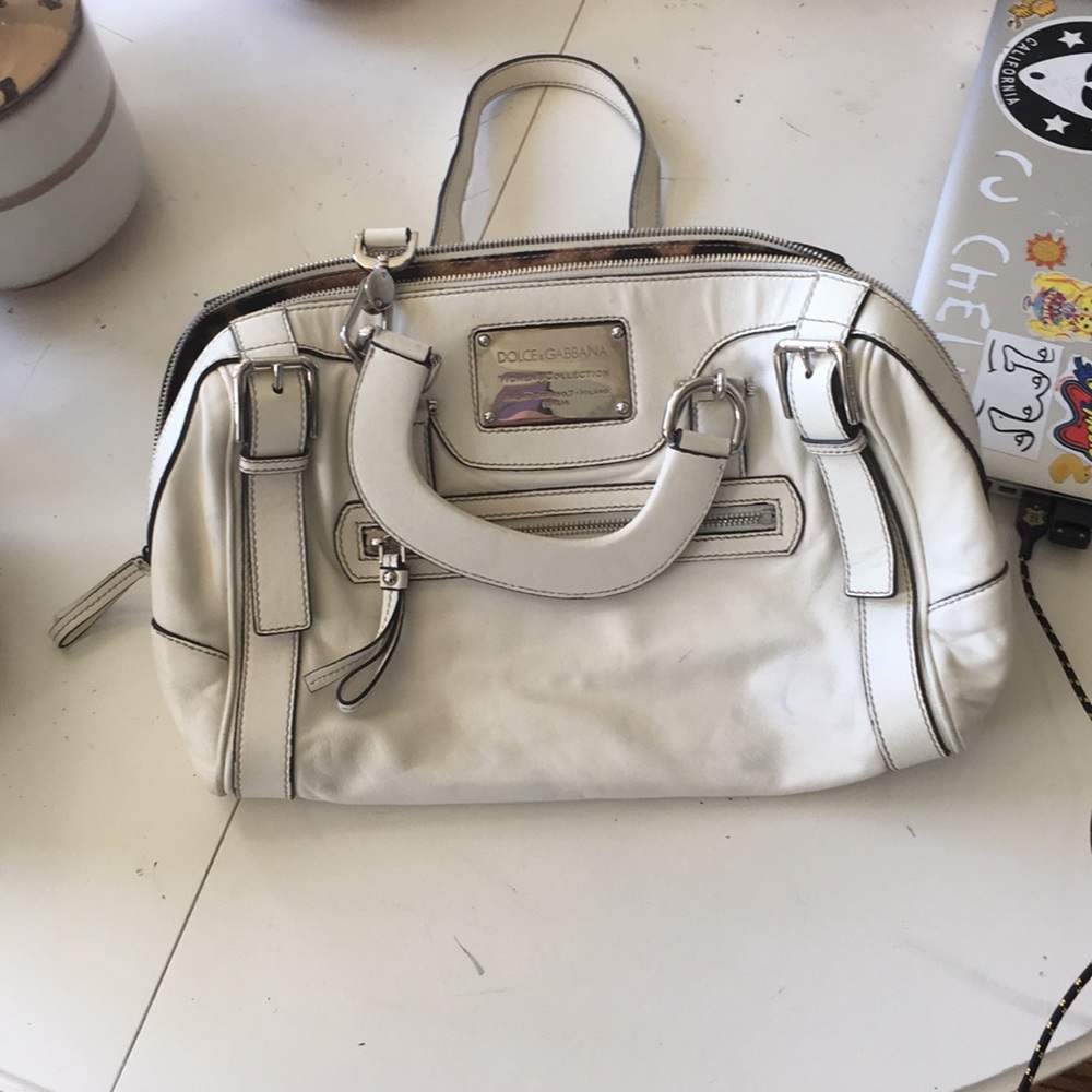Dolce&Gabbana off white purse with cheetah inside